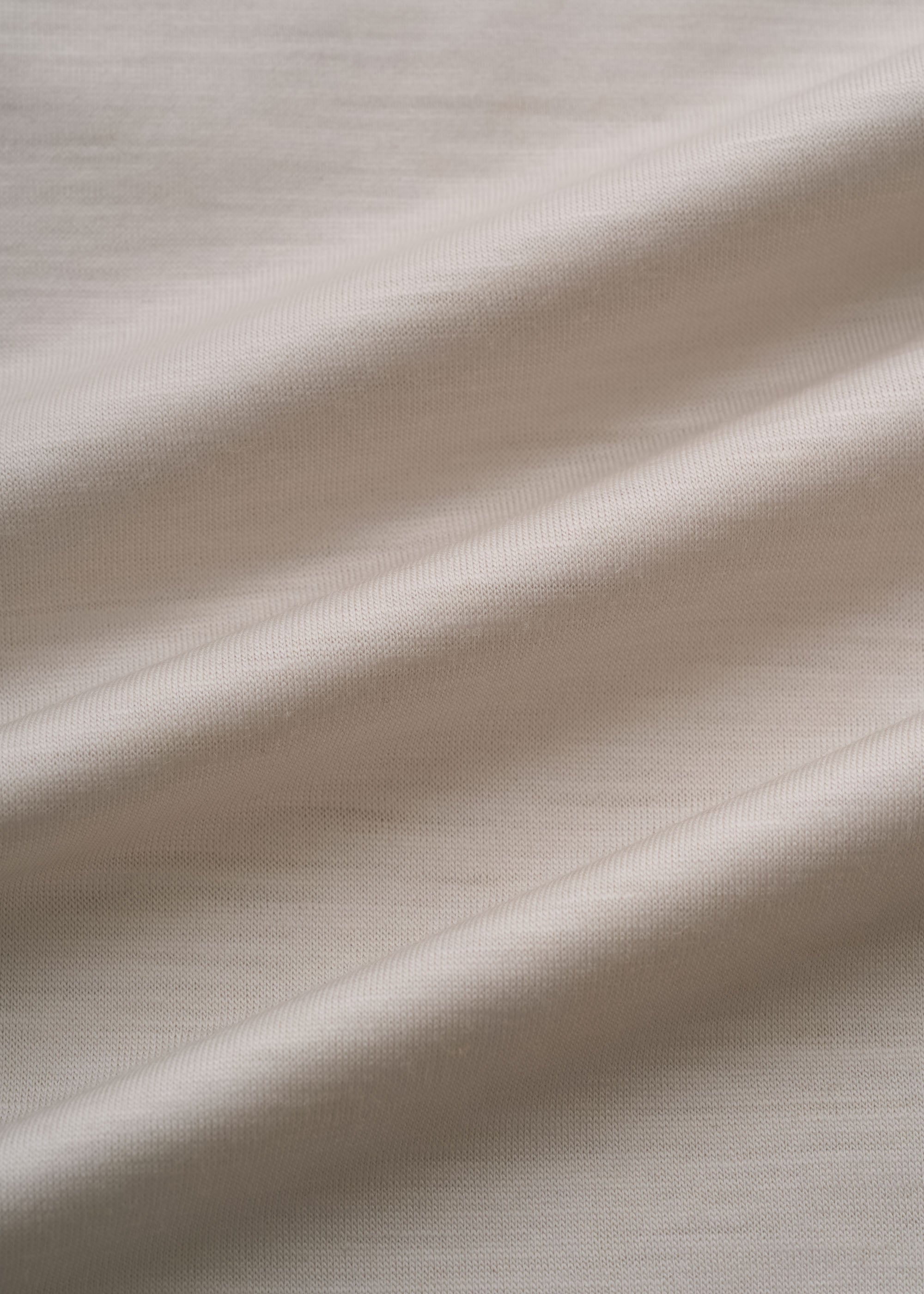 クリアウールタートルネックカットソー