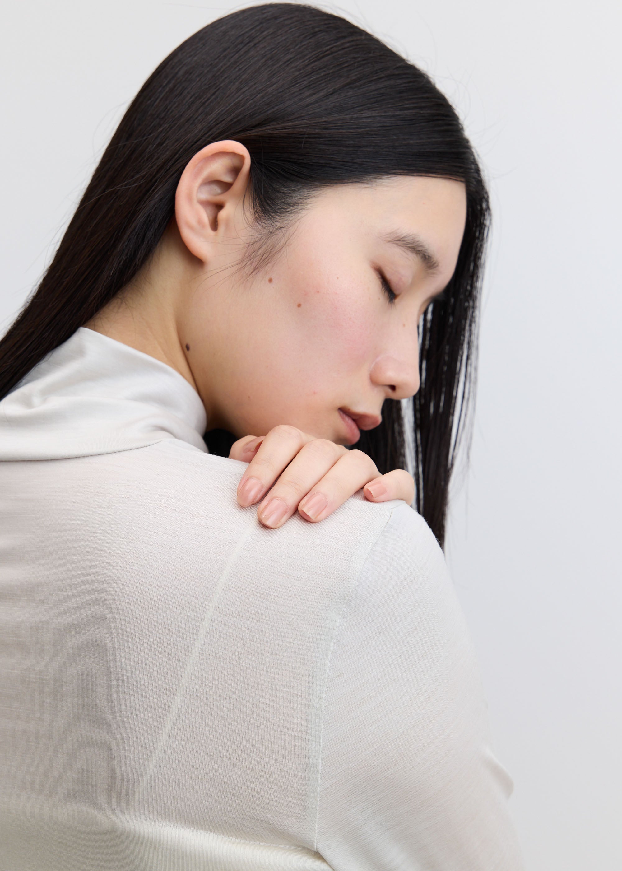 クリアウールタートルネックカットソー