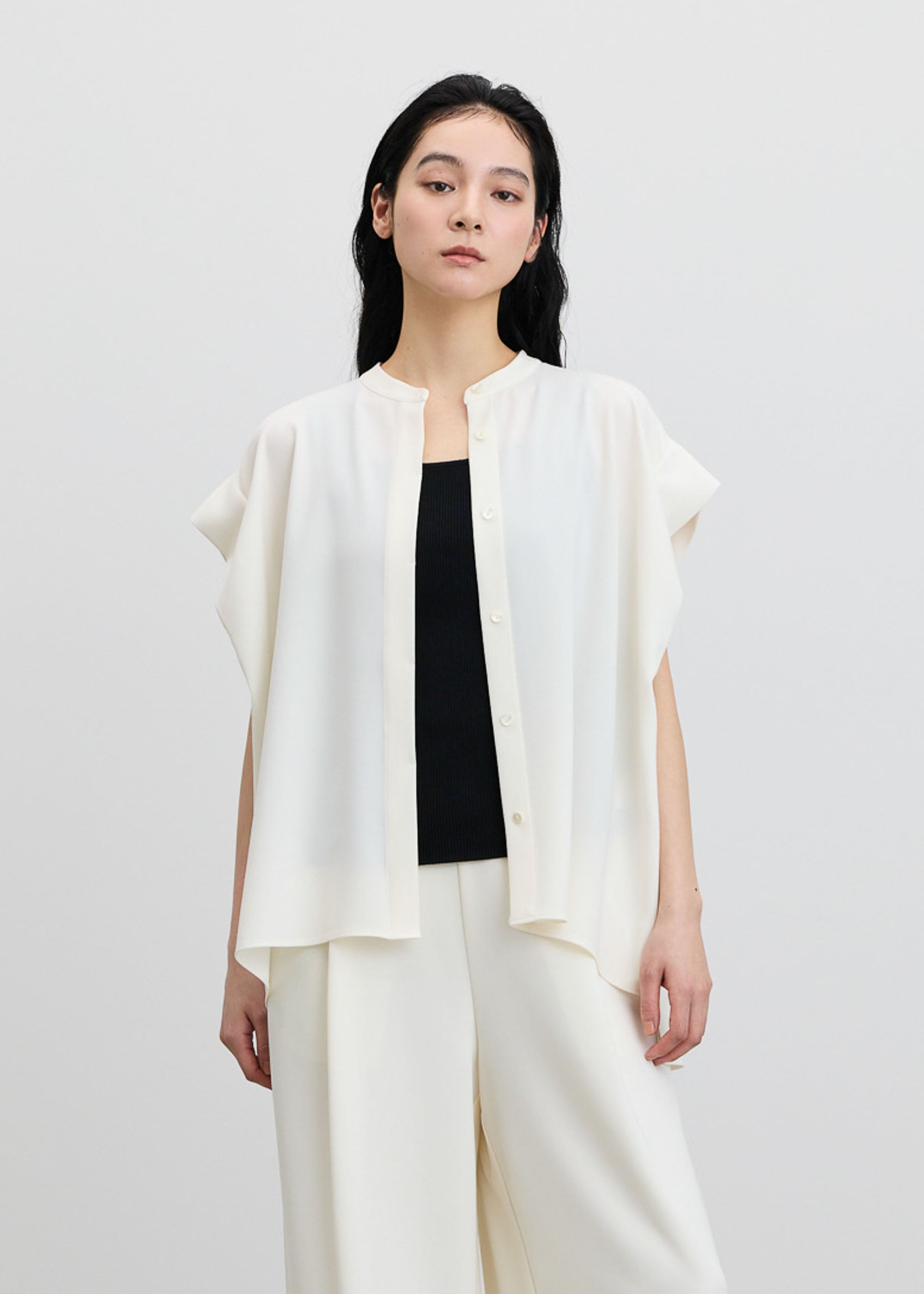 オーバーサイズタックスリーブシャツ